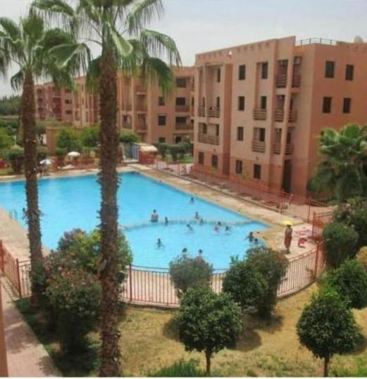 Ferienwohnung Charmant Logement Avec Parking Residenciel Sans Piscine Marrakesch Exterior foto